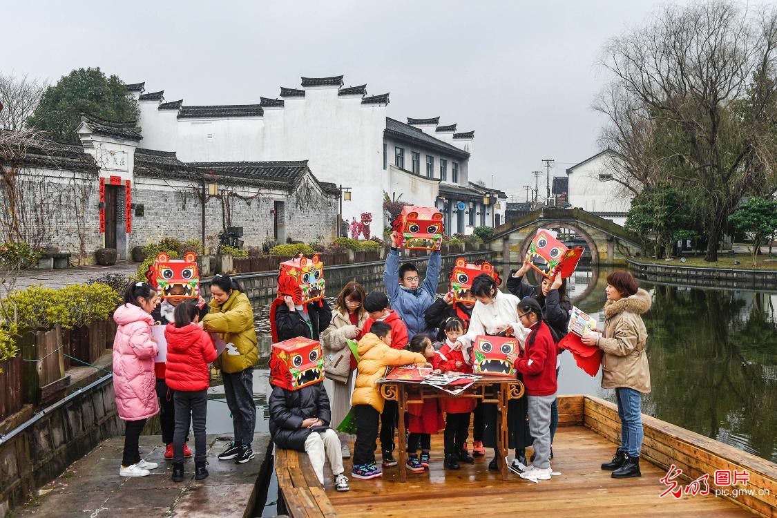 包汤圆 舞虎头 庆元宵